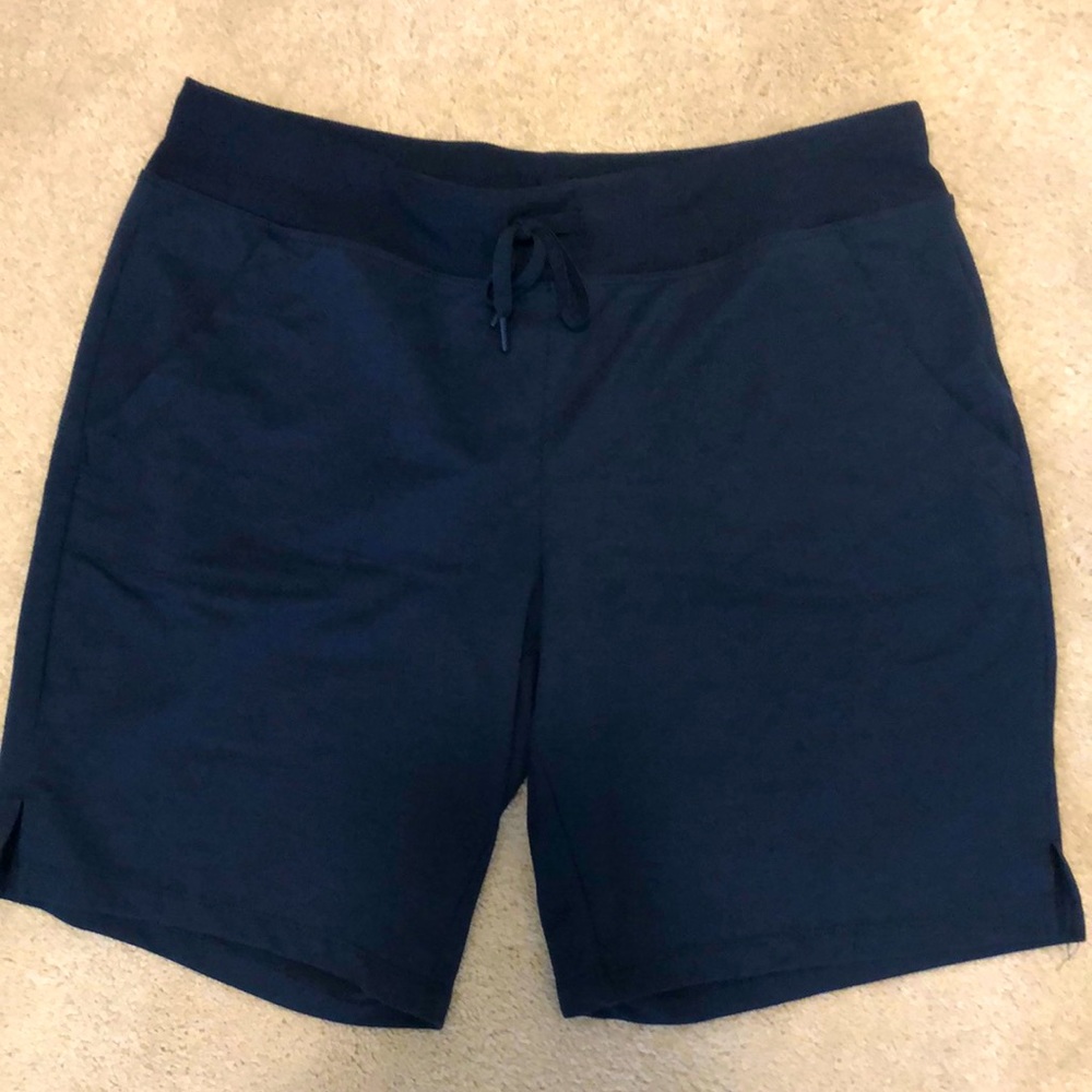 Navy blue. Very comfortable.  Pull on shorts with tie in front